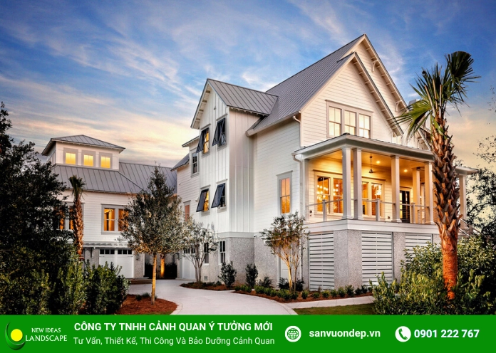 Biệt thự hiện đại có sân vườn xanh mát với mảng cây được bố trí tinh gọn quanh lối đi