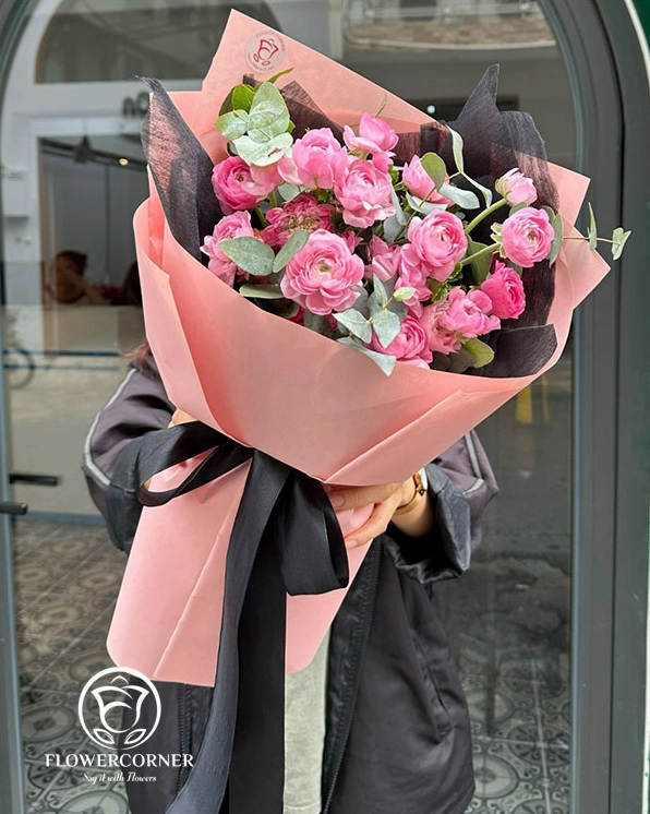 Bó Hoa Mao Lương tông hồng cam được bó tròn chỉn chu, gợi vẻ mềm mại và hiện đại