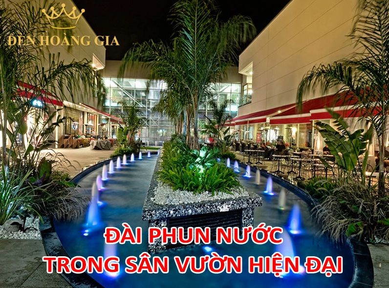 Đài phun nước trong sân vườn hiện đại tạo chuyển động mềm mại giữa cây xanh và ánh sáng