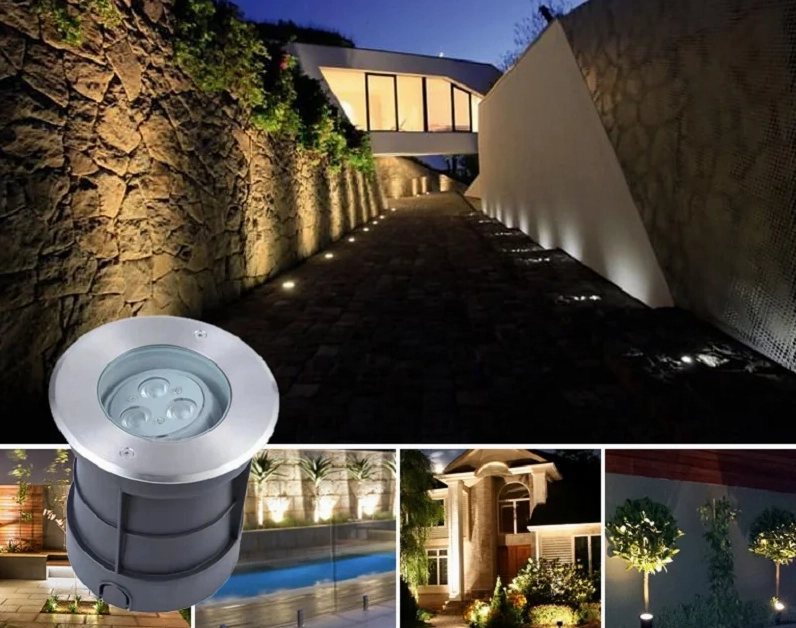 Đèn LED âm đất lắp sát nền tạo luồng sáng hắt lên trong sân vườn