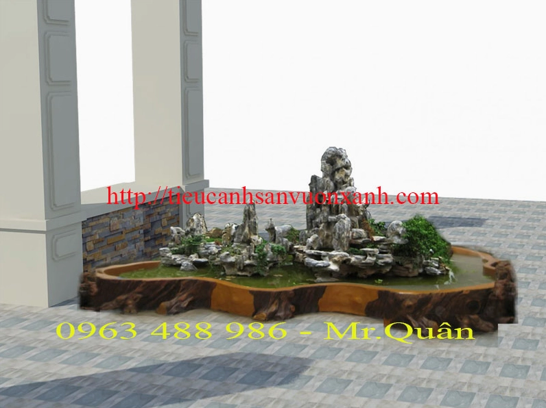 Hòn non bộ nhỏ trong tiểu cảnh ban công với dáng đá tự nhiên và mảng xanh dịu mắt