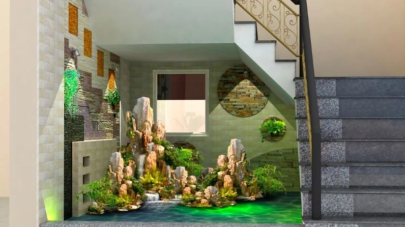 Mẫu hòn non bộ trong nhà lung linh với ánh sáng làm nổi bật đường nét đá và cây cảnh