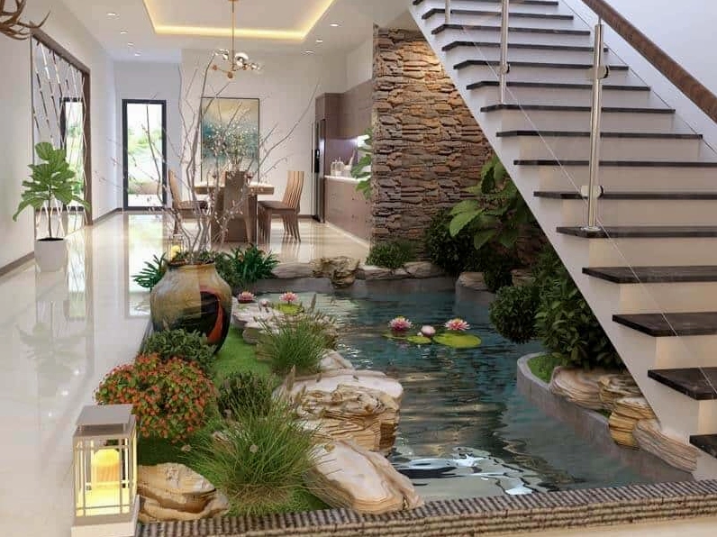 Thi công tiểu cảnh giếng trời với cây xanh đón ánh sáng tự nhiên từ trên cao