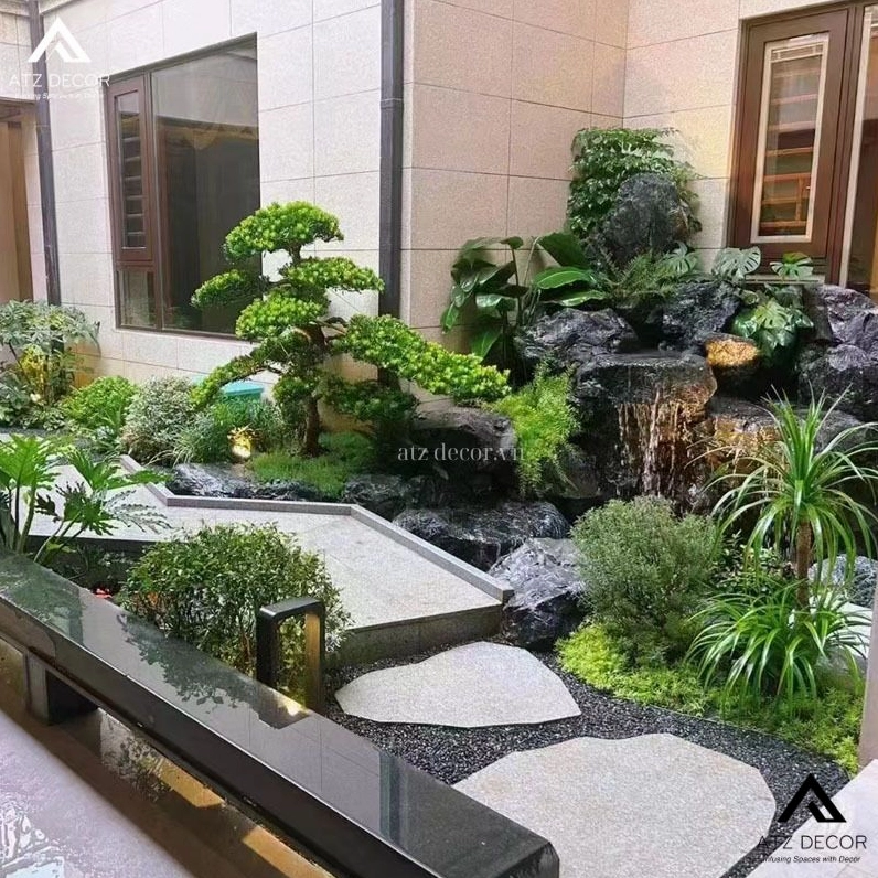 Tiểu cảnh sân vườn mini đẹp với cây xanh nhỏ gọn và bố cục tinh tế